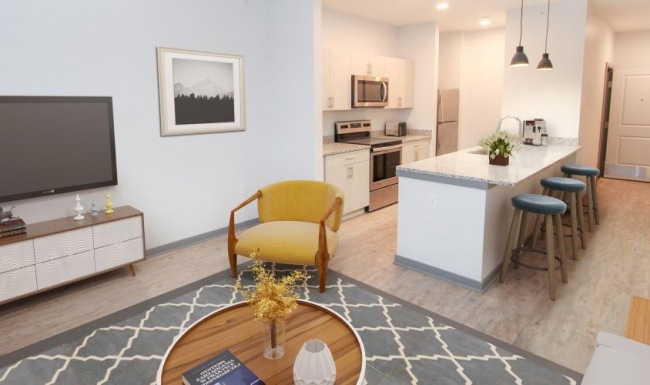 A perfect fit for the whole family a kitchen with a tv and a table